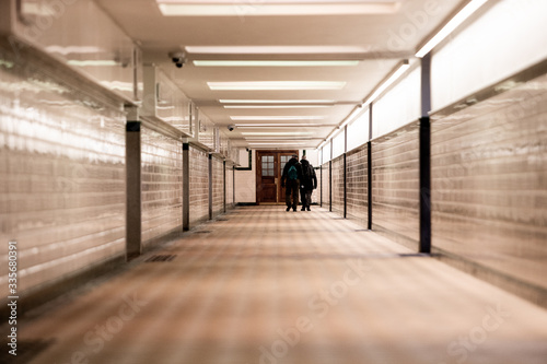 people walking in the corridor