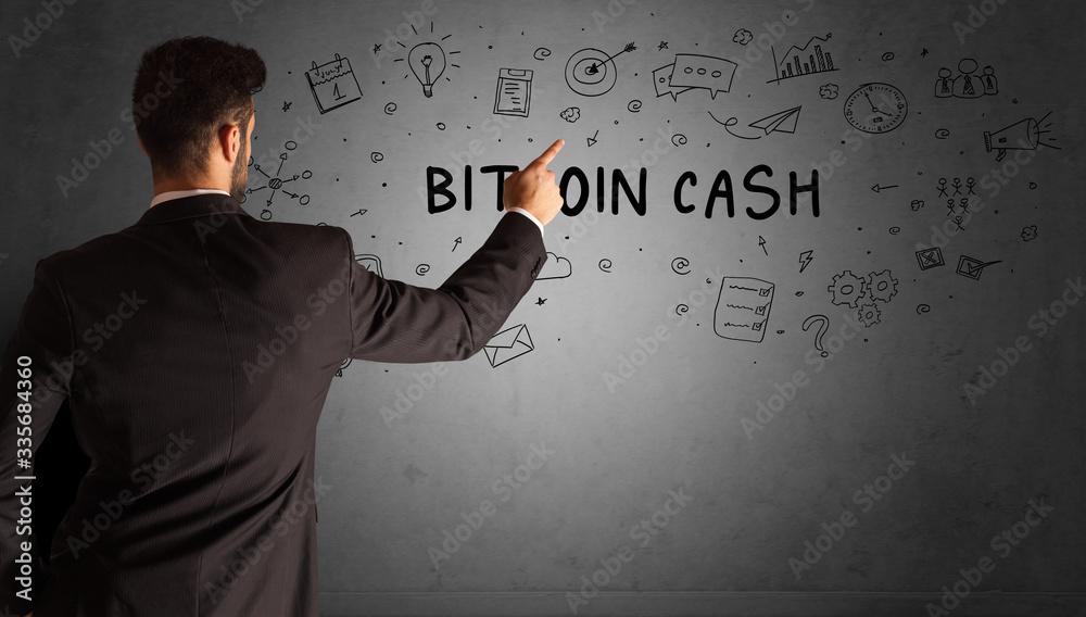 businessman drawing a creative idea sketch with BITCOIN CASH inscription, business strategy concept businessman drawing a creative idea sketch with BITCOIN CASH inscription, business strategy concept