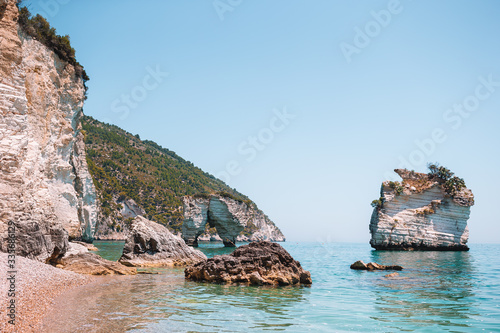 Mattinata Faraglioni stacks and beach coast of Mergoli, Vieste Gargano, Apulia, Italy.