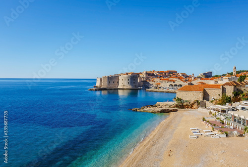 Fototapeta Naklejka Na Ścianę i Meble -  Beautiful landscape view of old town Dubrovnik, sand beach and blue Adriatic sea