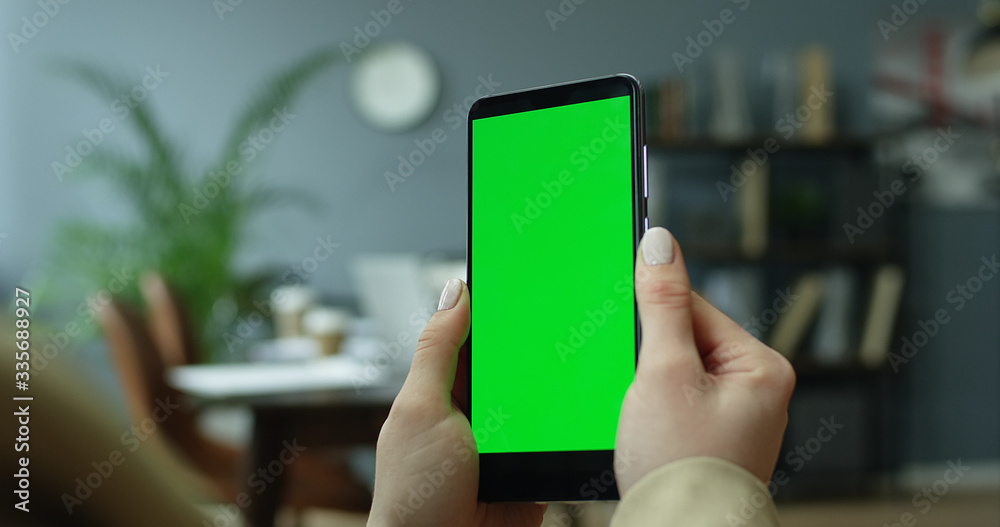 Mockup image of female hands holding mobile phone with blank screen ...
