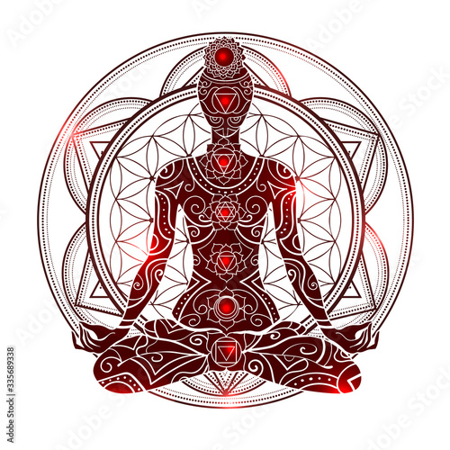 Ornate silhouette with chakras meditating in lotus position on the background of the mandala. Yoga position