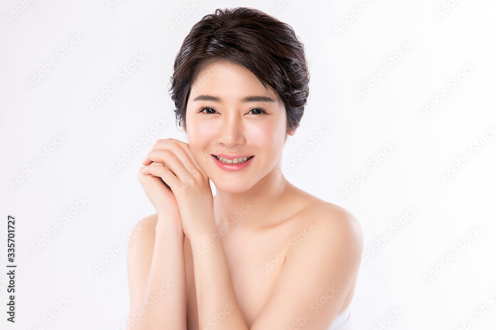 Beautiful Young Asian Woman with Clean Fresh Skin. Face care, Facial treatment, Cosmetology, beauty and healthy skin and cosmetic concept, woman beauty skin isolated on white background Beautiful Young Asian Woman with Clean Fresh Skin. Face care, Facial treatment, Cosmetology, beauty and healthy skin and cosmetic concept, woman beauty skin isolated on white background