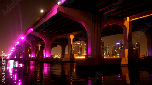 Mc Arthur Causeway from Miami to Miami Beach illluminated at night photo