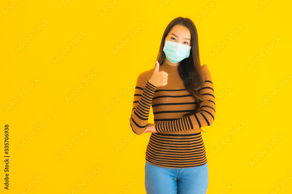 Portrait beautiful young asian woman with mask in many action for protect from coronaviruse or covid19 Portrait beautiful young asian woman with mask in many action for protect from coronaviruse or covid19