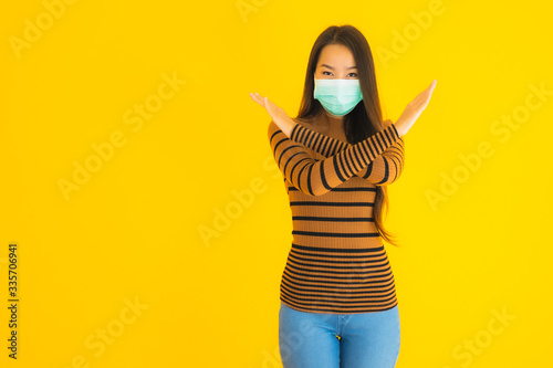 Portrait beautiful young asian woman with mask in many action for protect from coronaviruse or covid19