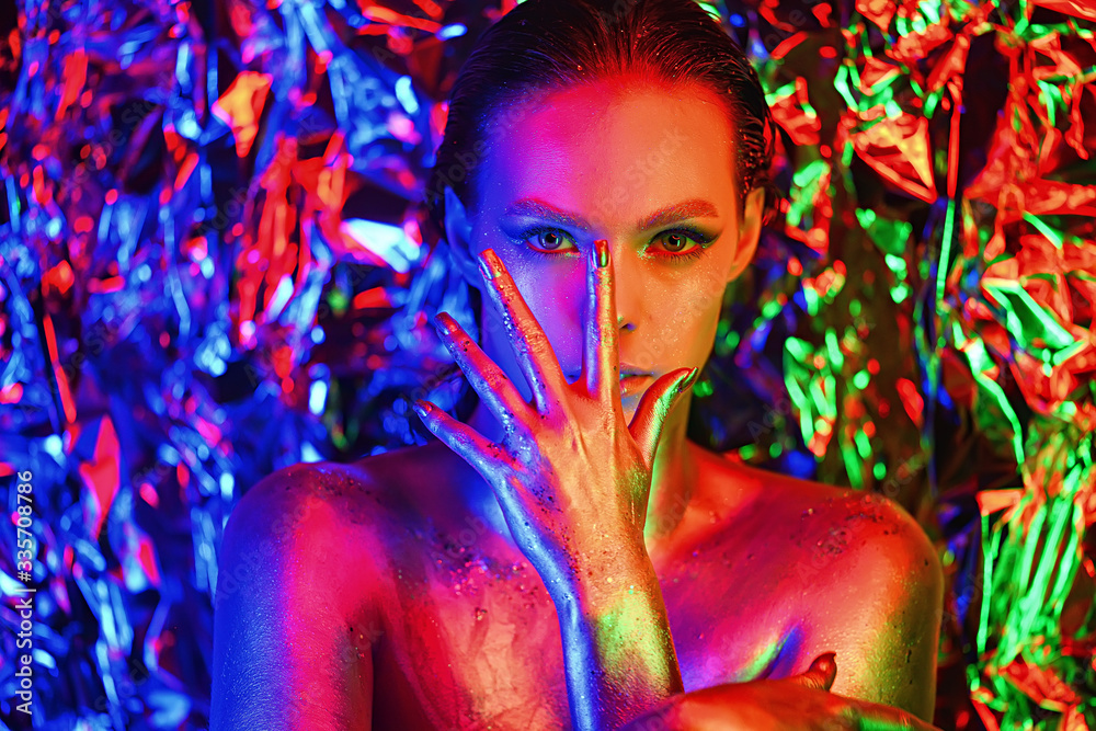 Fashion model woman in neon light, portrait of beautiful model with ...
