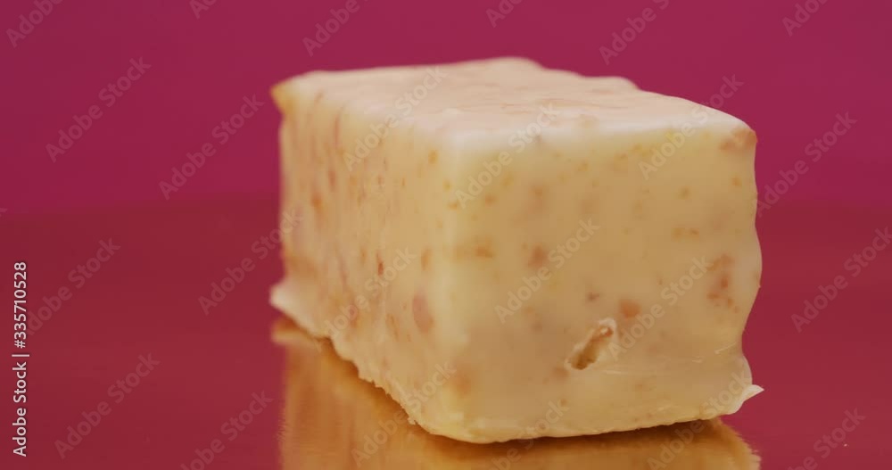 The pastry is covered with white chocolate The pastry is covered with white chocolate