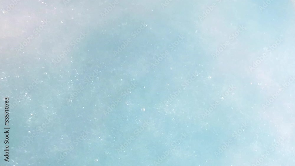 bubble floating in the colored water background bubble floating in the colored water background