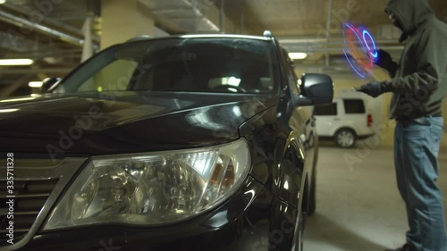 car cracker open the door of car at parking using technology with virtual reality