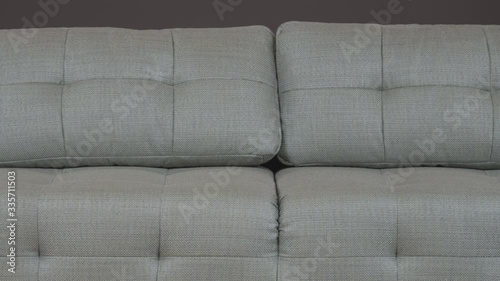 Classic sofa with gray textile upholstery. Fits perfectly into the interior. photo