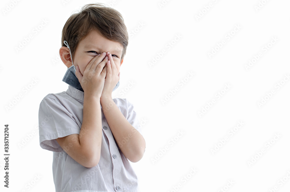Young boy opens protection mask and covers his nose with his hands, on white background, with clipping path, environmental and healthy concept Young boy opens protection mask and covers his nose with his hands, on white background, with clipping path, environmental and healthy concept
