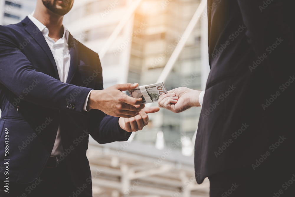 Ταπετσαρία Someone giving bribe, money to businessperson or politician by giving bribe or cash to someone in city