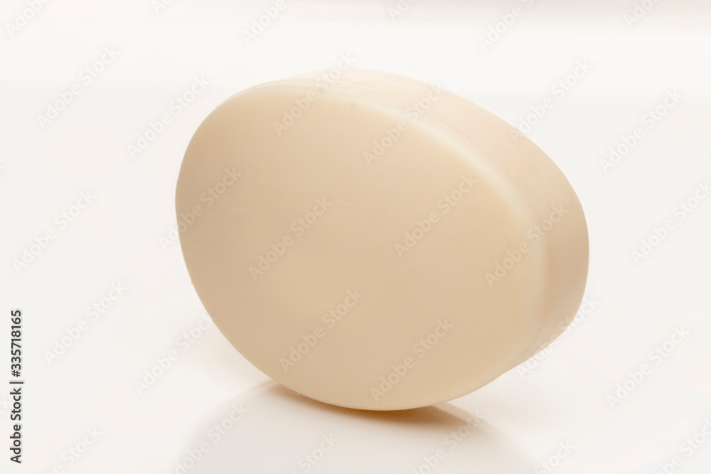 soap on a white background. close-up, beige color soap on a white background. close-up, beige color
