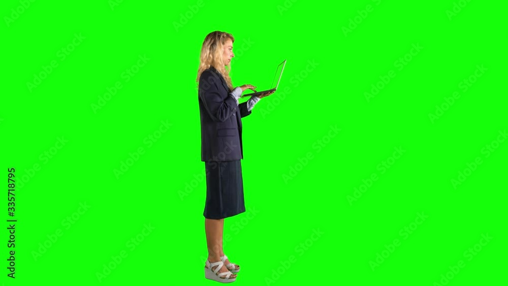 Side view of Caucasian businesswoman using laptop Side view of Caucasian businesswoman using laptop