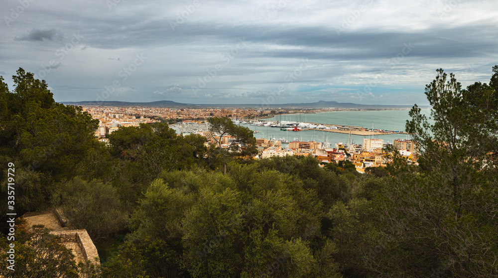 Panorama of Palma de Mallorca with the port and the cathedral on a cloudy day in spring. View from castell de bellver.