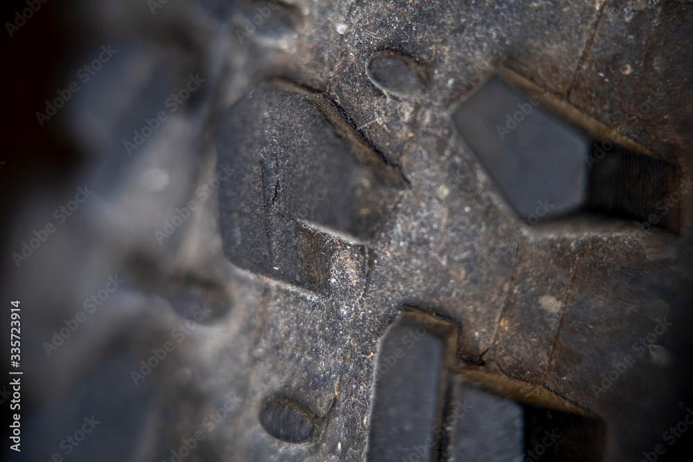 Blurred with a strong increase in the photo of the surface of the dirty tire Blurred with a strong increase in the photo of the surface of the dirty tire