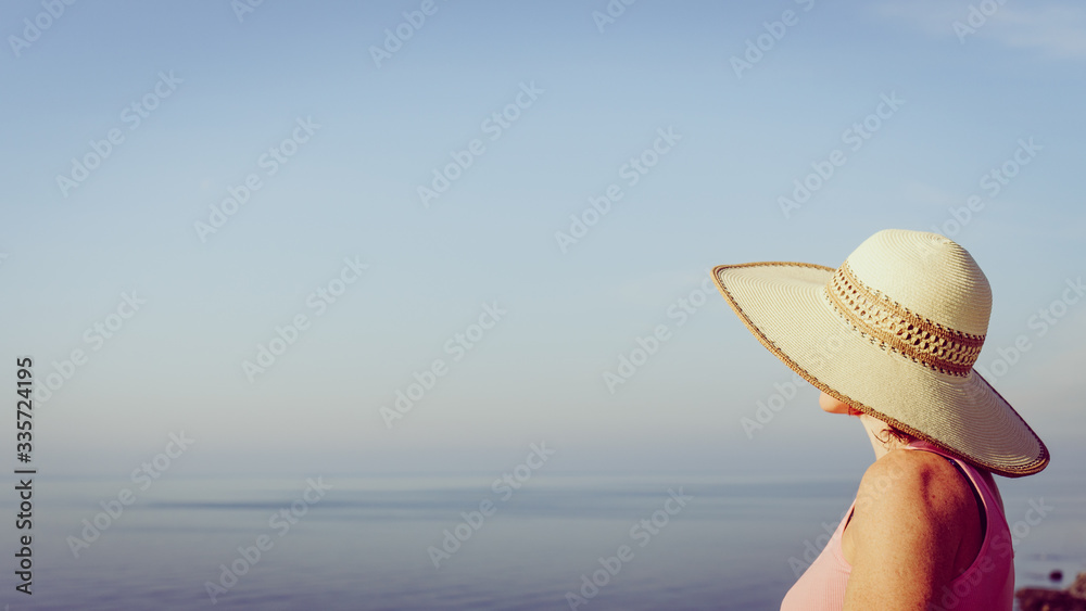 Woman enjoy coast view in Spain - obrazy, fototapety, plakaty 