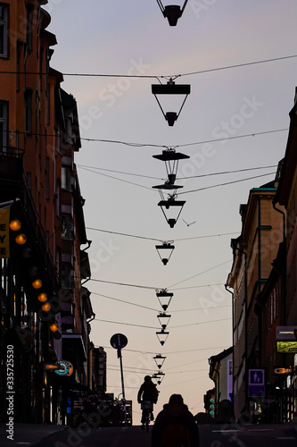 Photography Stockholm, Sweden The hill on Gotgatan on the island of Sodermalm in the early morning and a bicyclist