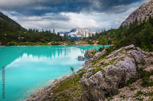 Summer alpine landscape with turquoise glacier lake  Sorapis  Dolomites  Italy