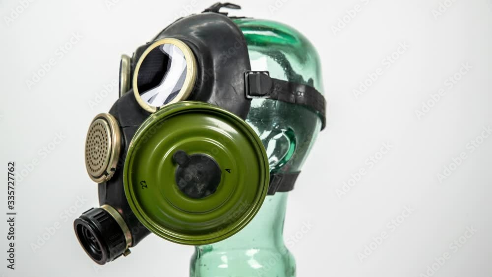 spinning gas mask agaisnt white spinning gas mask agaisnt white