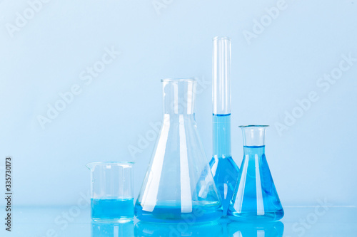research studies on the search for vaccines, laboratory glassware, equipment, tests.