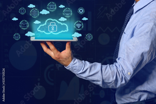 Businessman with tablet com...