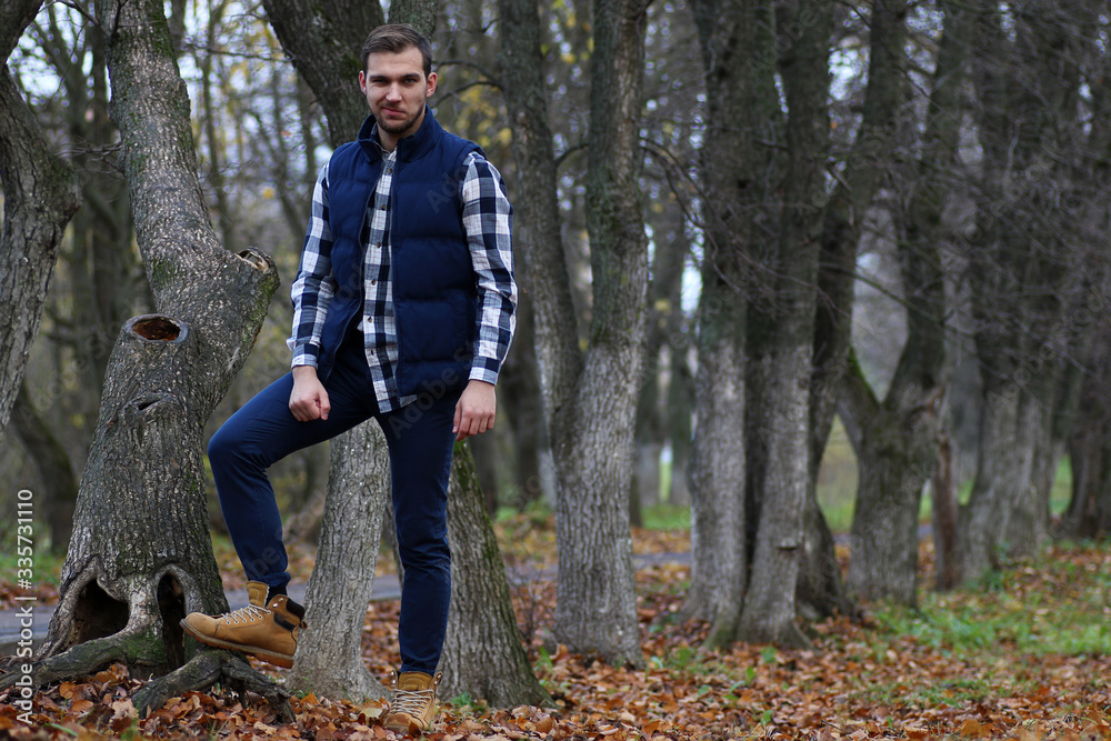 Young beard man in an autumn