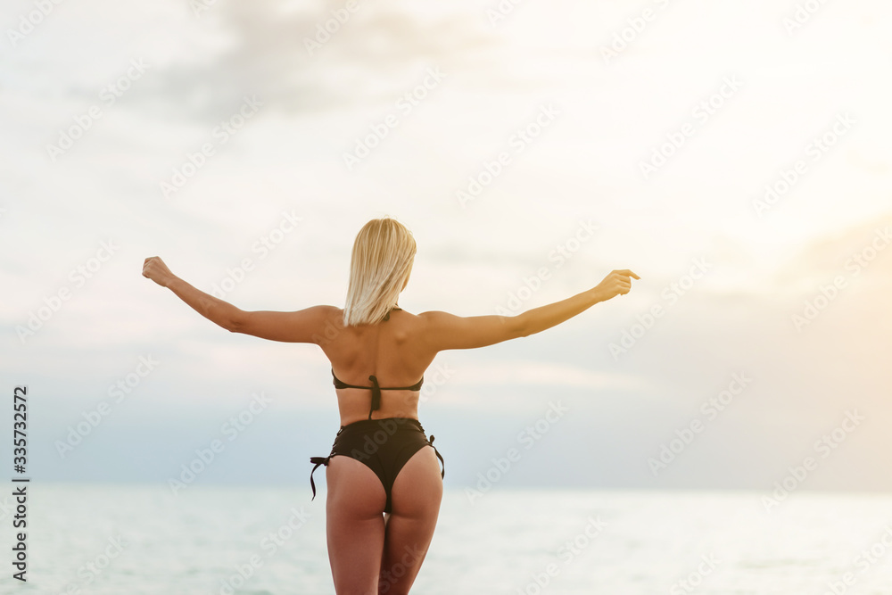 Close up portrait of beautiful young woman on the beach. Young caucasian female model on the sea shore. Close up portrait of beautiful young woman on the beach. Young caucasian female model on the sea shore.
