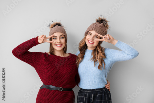 Young women in warm sweater...