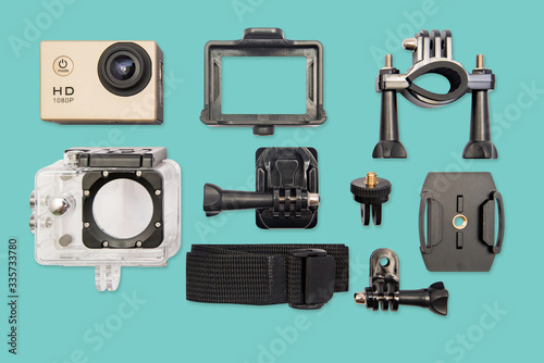 HD action camera isolated on green pastel background