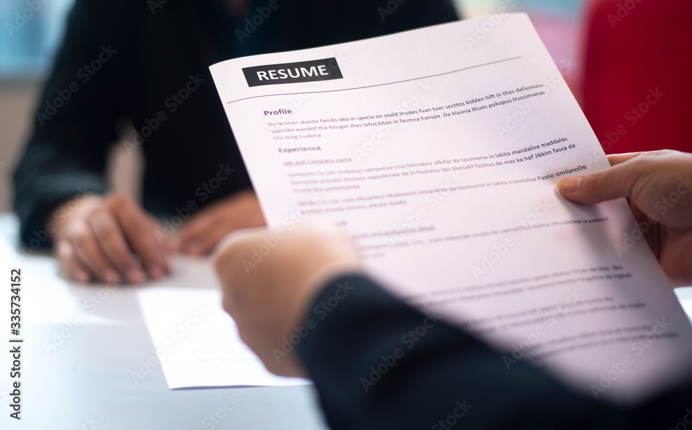 Recruitment, contract and business  employment concept. HR review the profile resume of the job applicant. Business employment and human resource management concept.