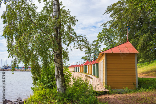 Colorful beach huts on a beach at Lake Vattern in Hjo  Sweden