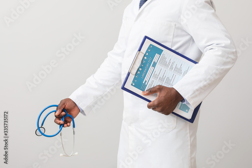 Medical professional holdin...