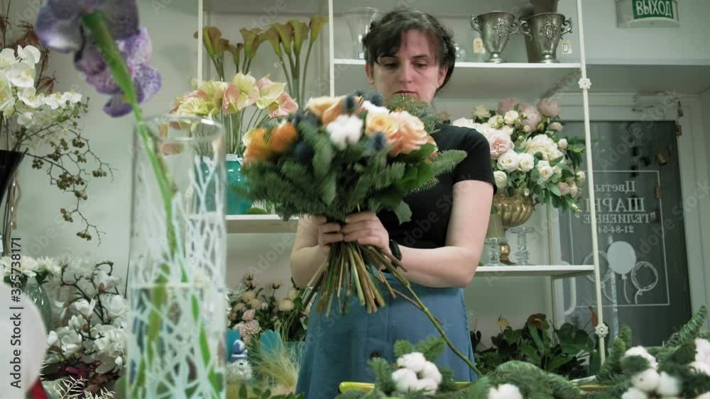 The work of the florist. Composing a bouquet The work of the florist. Composing a bouquet