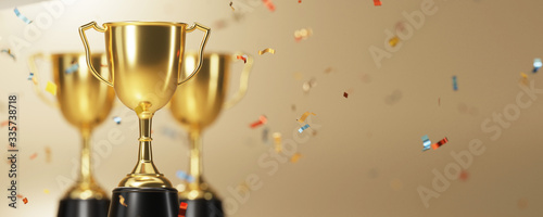 Photographie golden trophy award with falling confetti on gold background