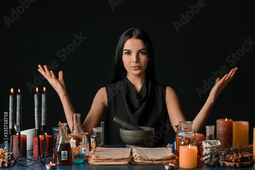 Female alchemist making pot...