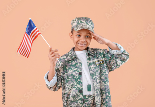 Little saluting African-Ame...