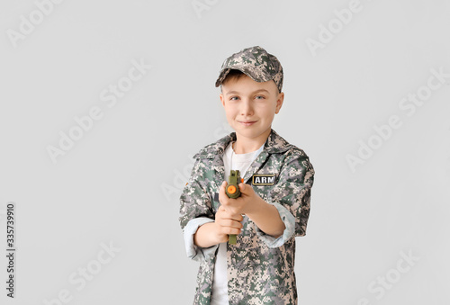 Cute little soldier with to...