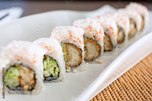 A view of a snow mountain roll in a restaurant or kitchen setting.