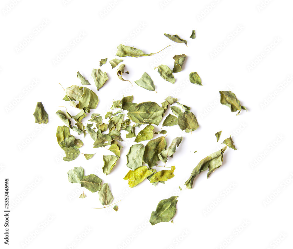 dry moringa leaves on white background dry moringa leaves on white background