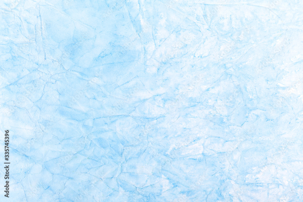Simple light blue abstract background texture, blue ice like winter cold surface, creased, crumpled paper cracks, uneven structure artsy backdrop, design, trendy wrinkled material, graphical resources