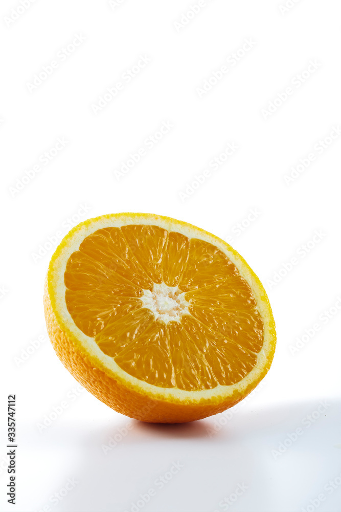 Fototapeta premium fresh orange fruit half isolated on white