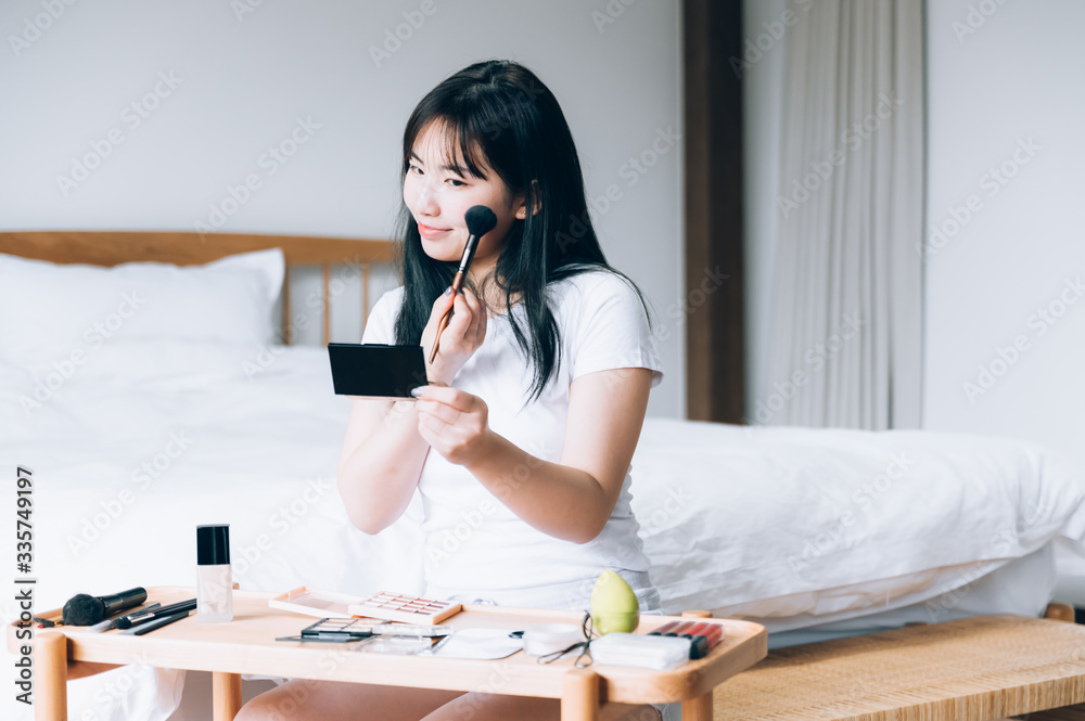 Asian young woman makeup at home Asian young woman makeup at home