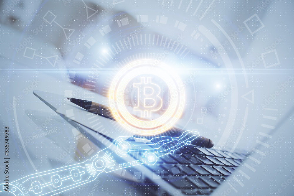 Multi exposure of blockchain and crypto economy theme hologram and table with computer background. Concept of bitcoin cryptocurrency. Multi exposure of blockchain and crypto economy theme hologram and table with computer background. Concept of bitcoin cryptocurrency.