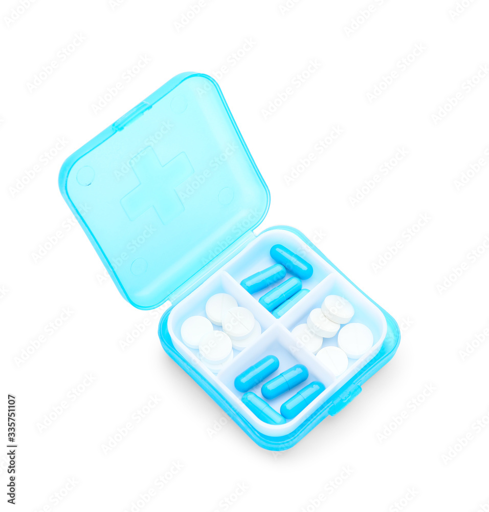 Container with pills on white background Container with pills on white background