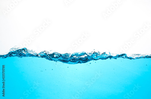 Moving water and blue bubbles on a white background