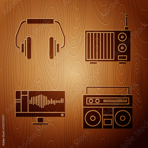 Set Home stereo with two speakers, Headphones, Sound or audio recorder on monitor and Radio with antenna on wooden background. Vector