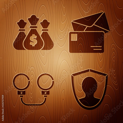 Set User protection, Money bag, Handcuffs and Envelope on wooden background. Vector