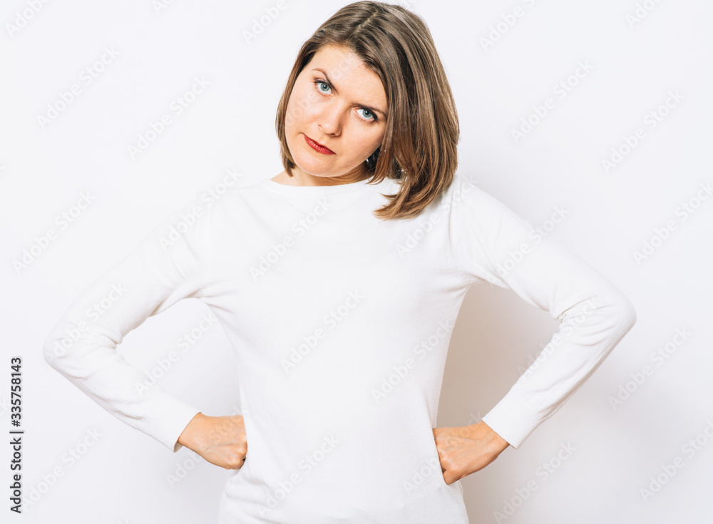 Beautiful young executive woman standing hands on hips